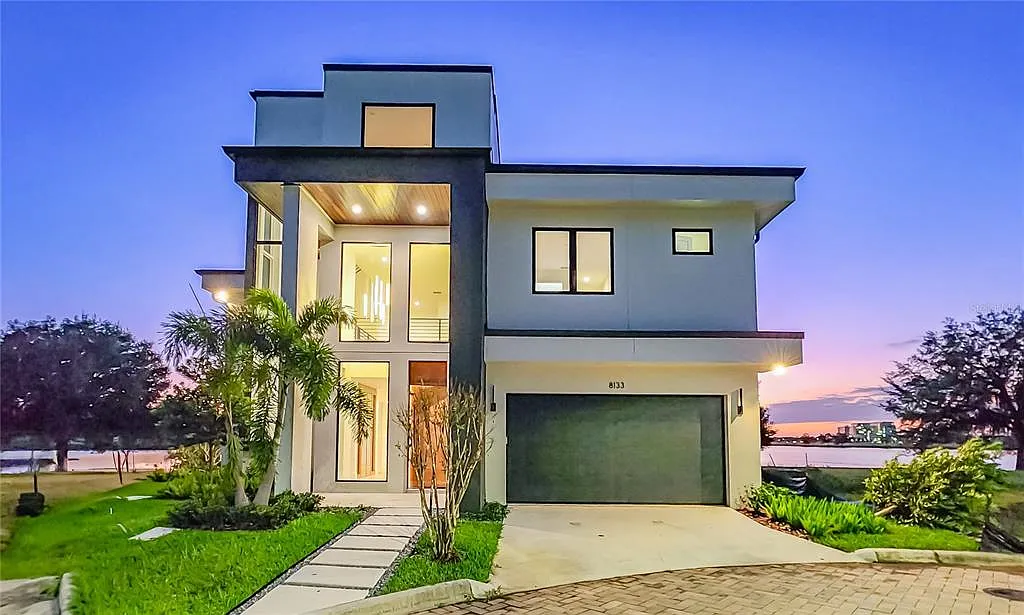 Luxurious $1.84M Lake Nona Masterpiece: Stunning Water Views and Premier Location in Laureate Park