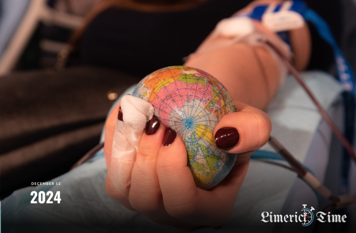 Blood donor giving blood at a clinic in Limerick during an urgent appeal for donations.